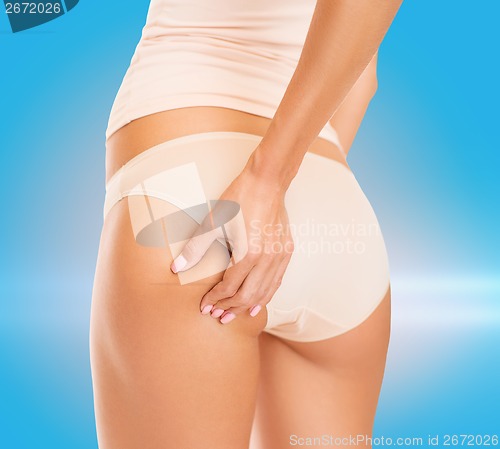 Image of woman in cotton underwear showing slimming concept