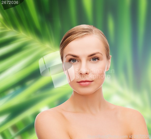 Image of face and shoulders of young woman