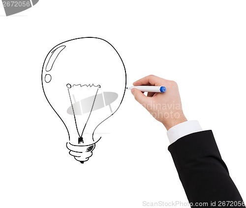 Image of close up of businessman drawing light bulb