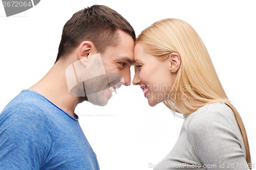 Image of smiling couple looking at each other