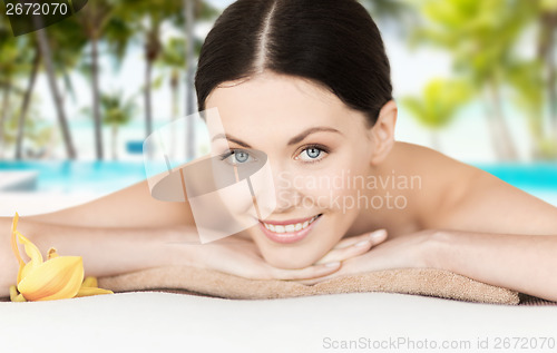 Image of smiling woman in spa salon