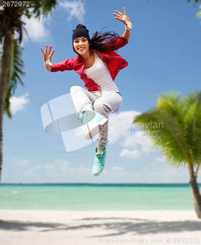 Image of beautiful dancing girl jumping