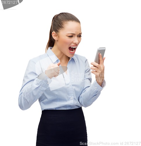 Image of screaming businesswoman with smartphone