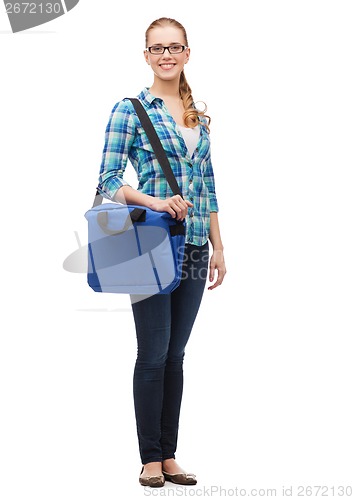 Image of smiling female student in glasses with laptop bag