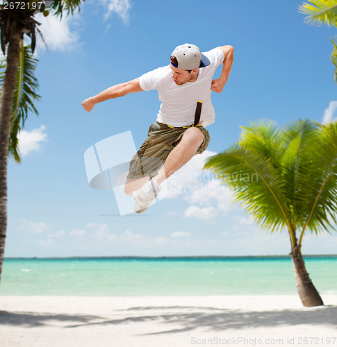 Image of male dancer jumping in the air