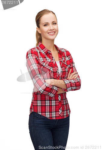 Image of smiling young woman in casual clothes