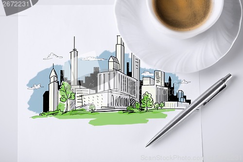 Image of paper for note with city sketch and coffee