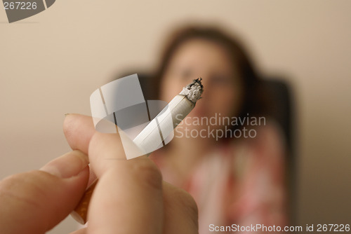 Image of Hand with cigarette