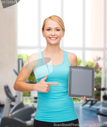 Image of sporty woman with tablet pc blank screen