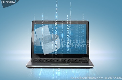 Image of laptop computer with code on screen