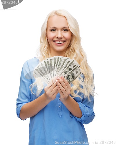 Image of smiling girl with dollar cash money