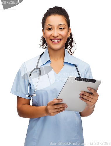 Image of doctor or nurse with stethoscope and tablet pc