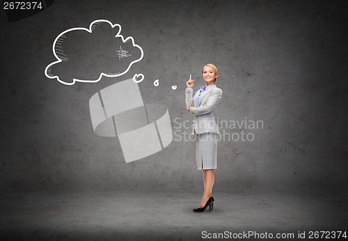 Image of attractive young businesswoman with her finger up