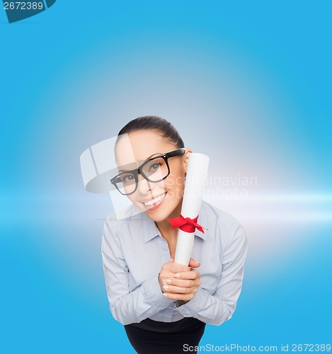 Image of smiling businesswoman in eyeglasses with diploma