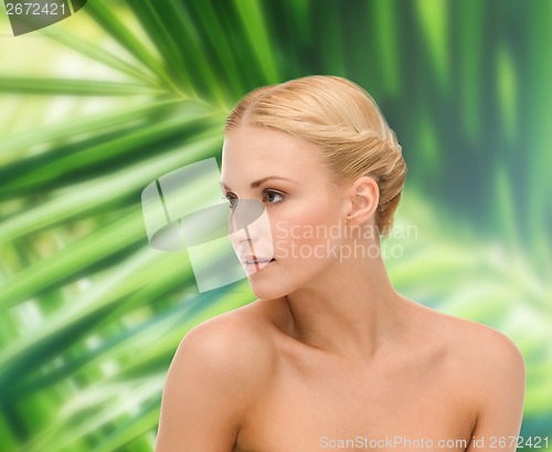 Image of face and shoulder of young woman