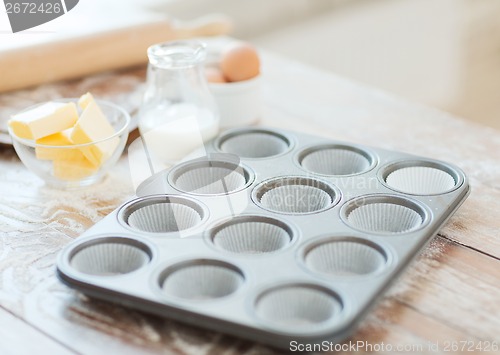 Image of close up of empty muffins molds