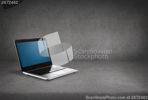 Image of laptop computer with blank black screen