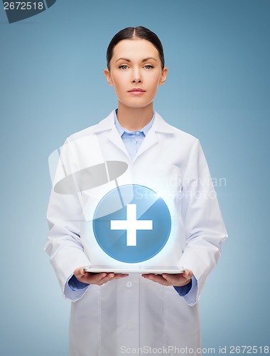 Image of female doctor without stethoscope and tablet pc