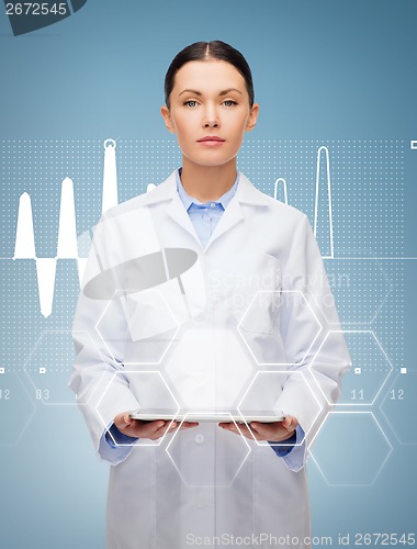 Image of female doctor without stethoscope and tablet pc