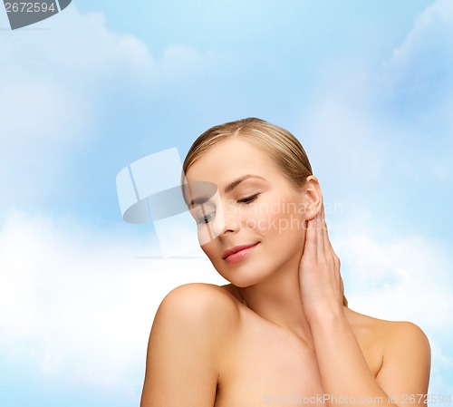 Image of face and hands of beautiful woman