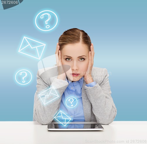 Image of smiling businesswoman with tablet pc