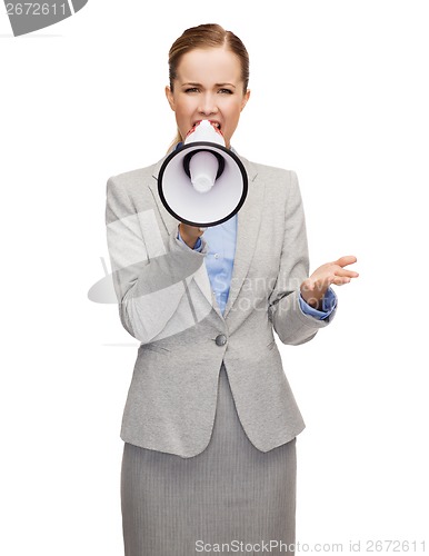 Image of angry businesswoman with megaphone