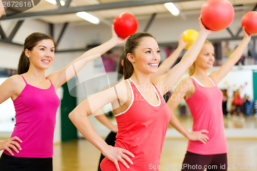 Image of group of people working out with stability balls