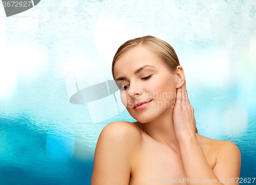 Image of face and hands of beautiful woman