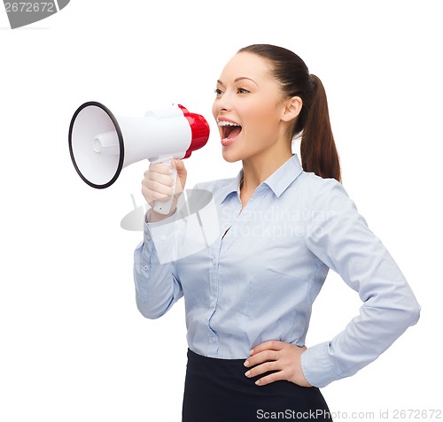 Image of screaming businesswoman with megaphone