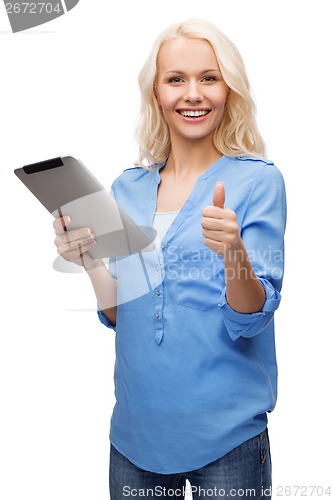 Image of girl with tablet pc computer showing thumbs up
