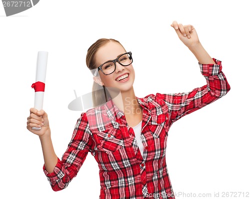 Image of laughing woman in eyeglasses with diploma