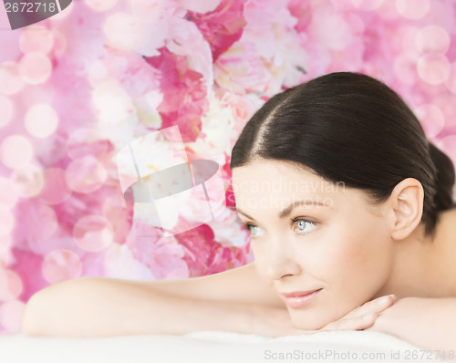 Image of smiling woman in spa salon