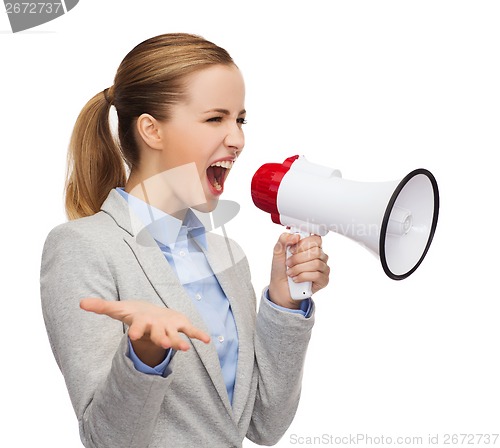 Image of angry businesswoman with megaphone