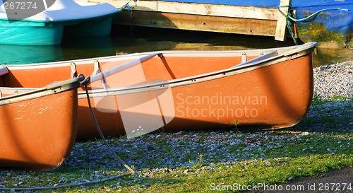 Image of canoes in the morning light