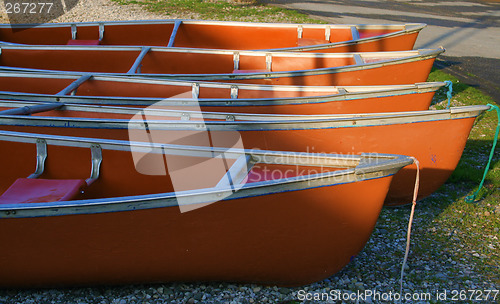 Image of canoes in the morning light