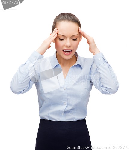 Image of upset businesswoman having headache