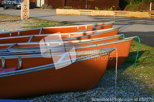 Image of canoes in the morning light