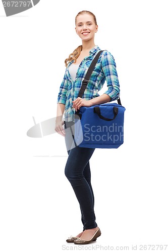 Image of smiling female student with laptop bag