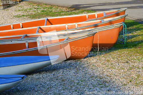 Image of canoes in the morning light