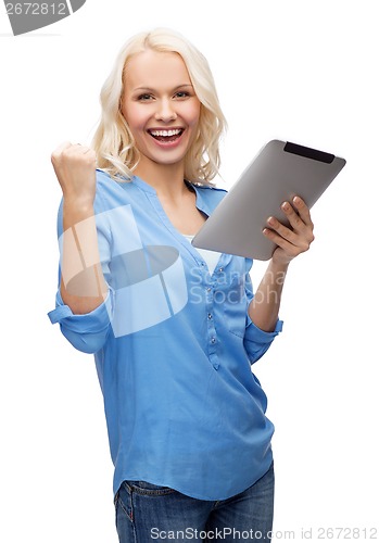 Image of happy young woman with tablet pc computer