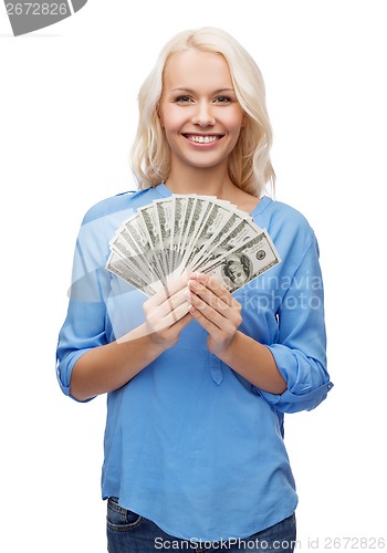 Image of smiling girl with dollar cash money