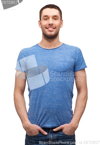 Image of smiling man in blank blue t-shirt