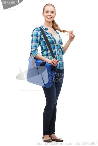 Image of smiling female student with laptop bag