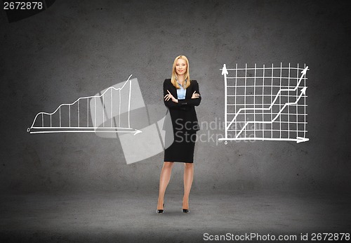 Image of friendly young smiling businesswoman