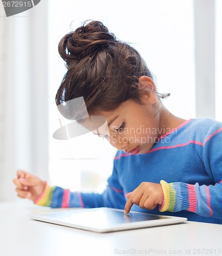 Image of little girl with tablet pc