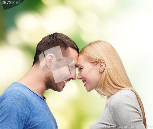 Image of smiling couple looking at each other