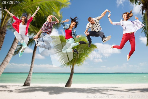 Image of group of teenagers jumping