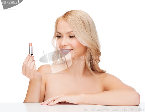 Image of beautiful woman with pink lipstick
