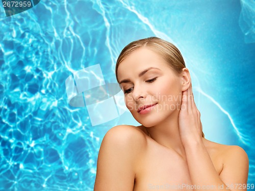 Image of face and hands of beautiful woman
