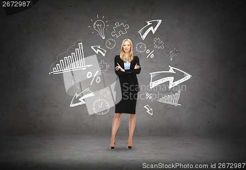 Image of friendly young smiling businesswoman